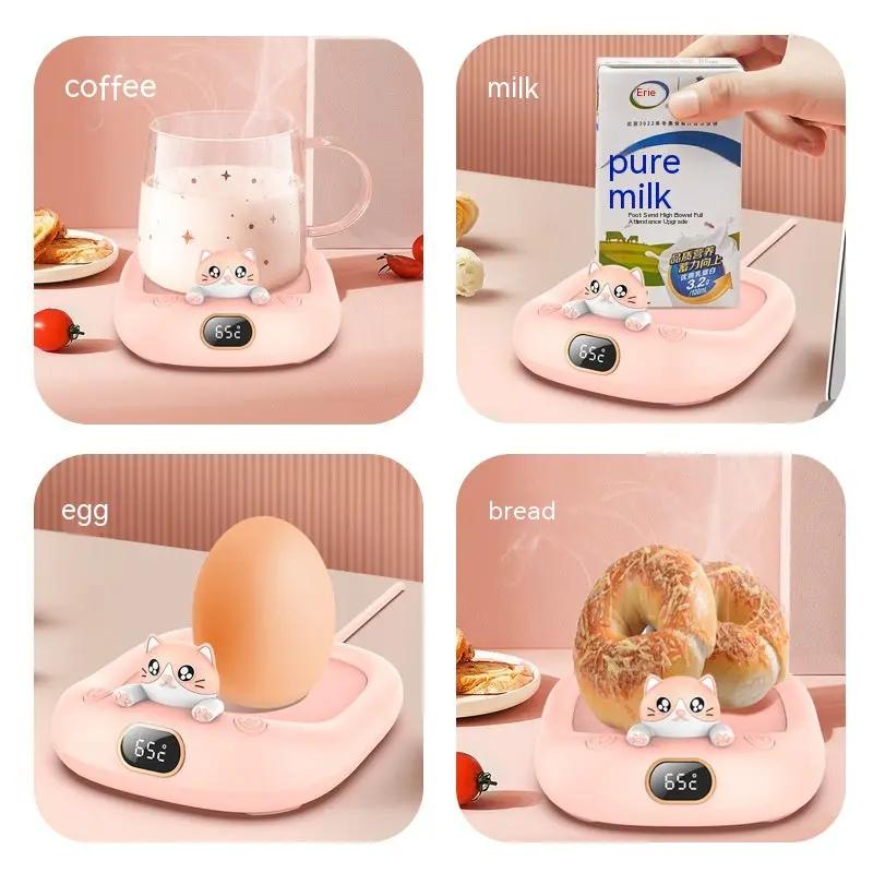Pink cat-shaped food warmer heating coffee, milk, egg, and bread with digital display