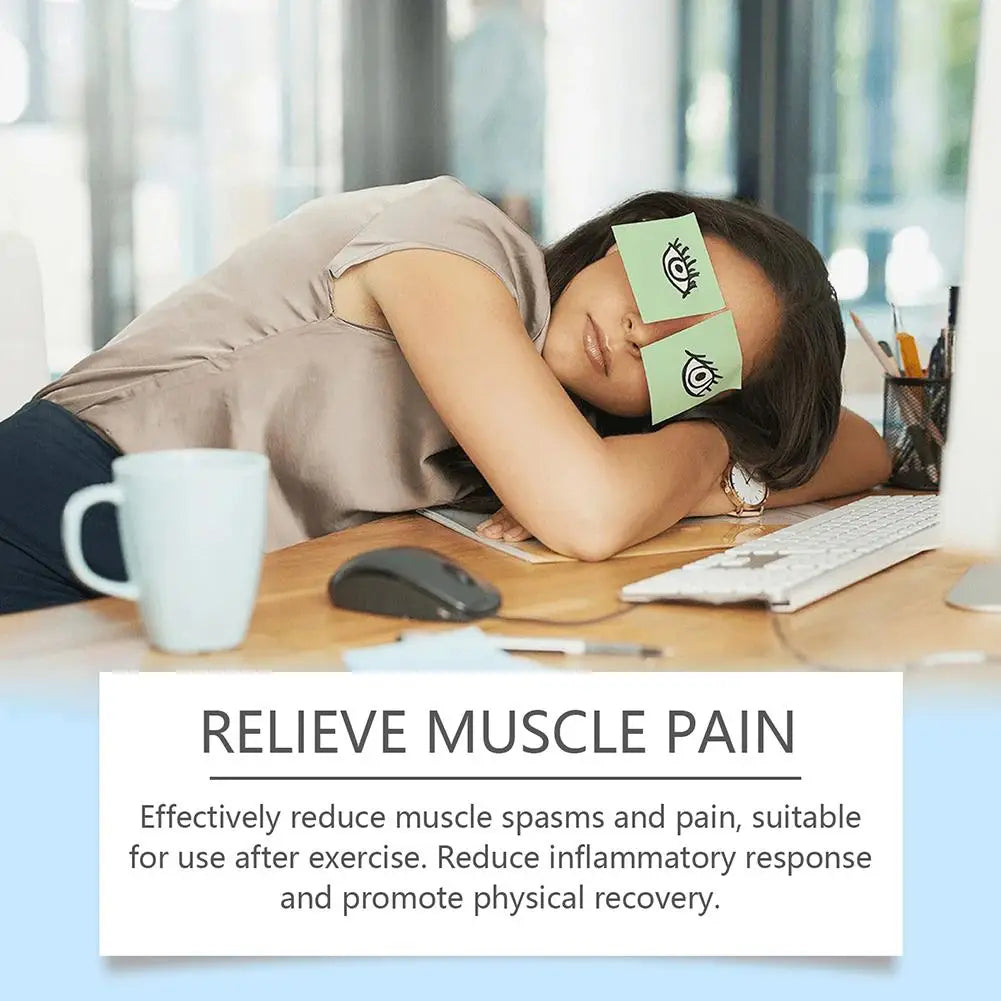 Tired office worker with eye-drawn sticky notes resting at desk near computer, relieve muscle pain concept