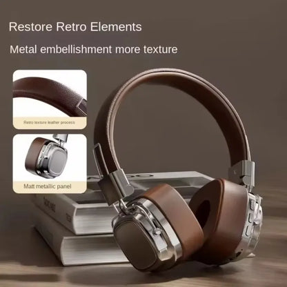 Brown retro-style over-ear headphones with metal accents on books, leather texture detail.