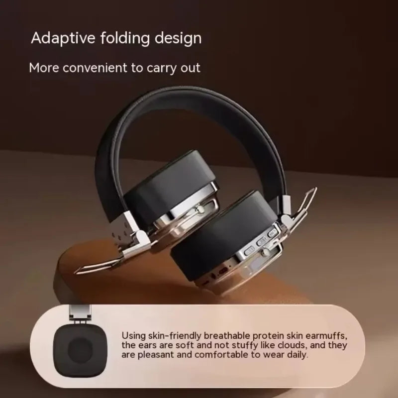 Foldable black and silver wireless headphones with protein skin earmuffs on brown background