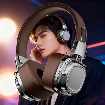 Man wearing brown over-ear headphones with metallic accents in a modern, colorful studio